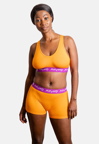 https://akukoshop.com/cdn/shop/products/set-nsibidi-soft-bralette-womens-boxers-orange-purple-shopify-4_large.jpg?v=1635363336